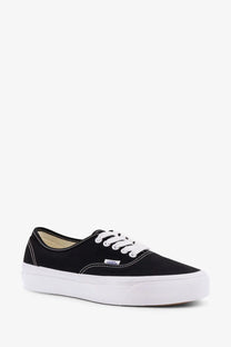 Vans men’s lx authentic reissue canvas sneakers in black with white laces and thick white rubber sole