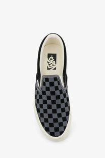 Vans men’s LX classic slip-on canvas sneakers in black and gray checkerboard with white rubber sole