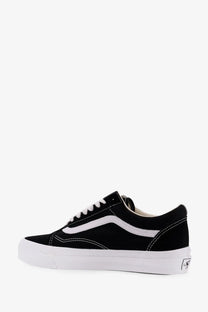 Vans men’s lx old skool black suede sneaker with white rubber sole and iconic side stripe front view