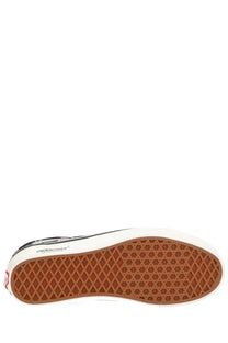 Back view of vans men’s sneaker otw old skool undercover black with brown diamond-patterned rubber sole and white midsole