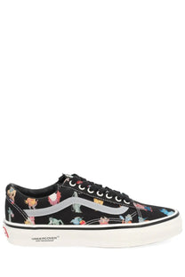 Black canvas Vans men’s sneaker Otw Old Skool with colorful cartoon print and silver Vans stripe undercover design