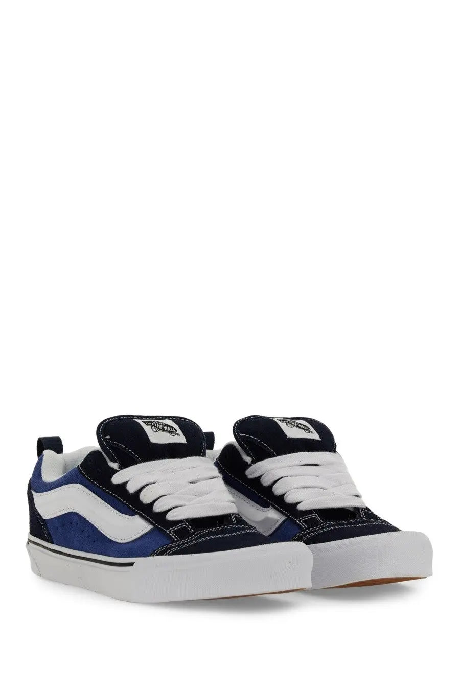 Navy and white Vans unisex knu skool sneaker with blue side paneling and durable canvas material for casual wear