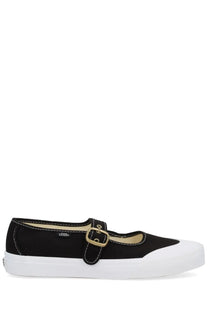 Vans unisex mary jane shoe in black canvas with white rubber sole and gold-tone buckle for casual wear