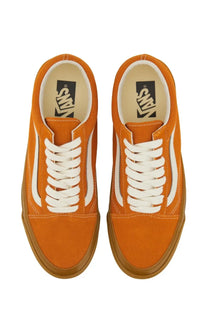 Vans unisex old skool xl sneaker in orange suede with white laces and tan rubber sole front view