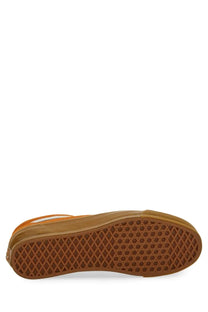 Orange and white vans unisex old skool xl slip-on sneaker with gum rubber sole and iconic diamond tread pattern