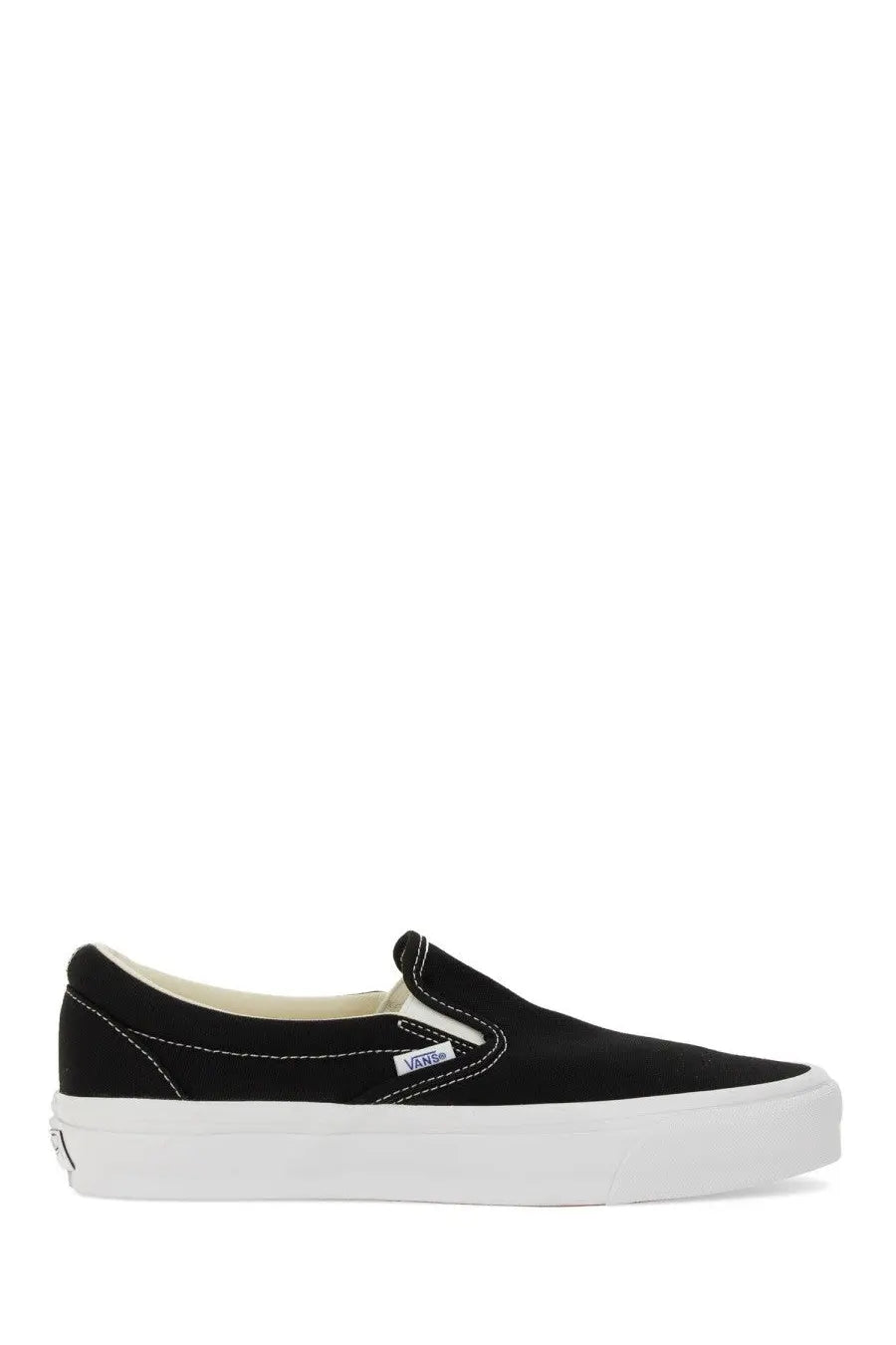 Black canvas Vans unisex slip on premium sneaker with white rubber sole and Vans logo tag