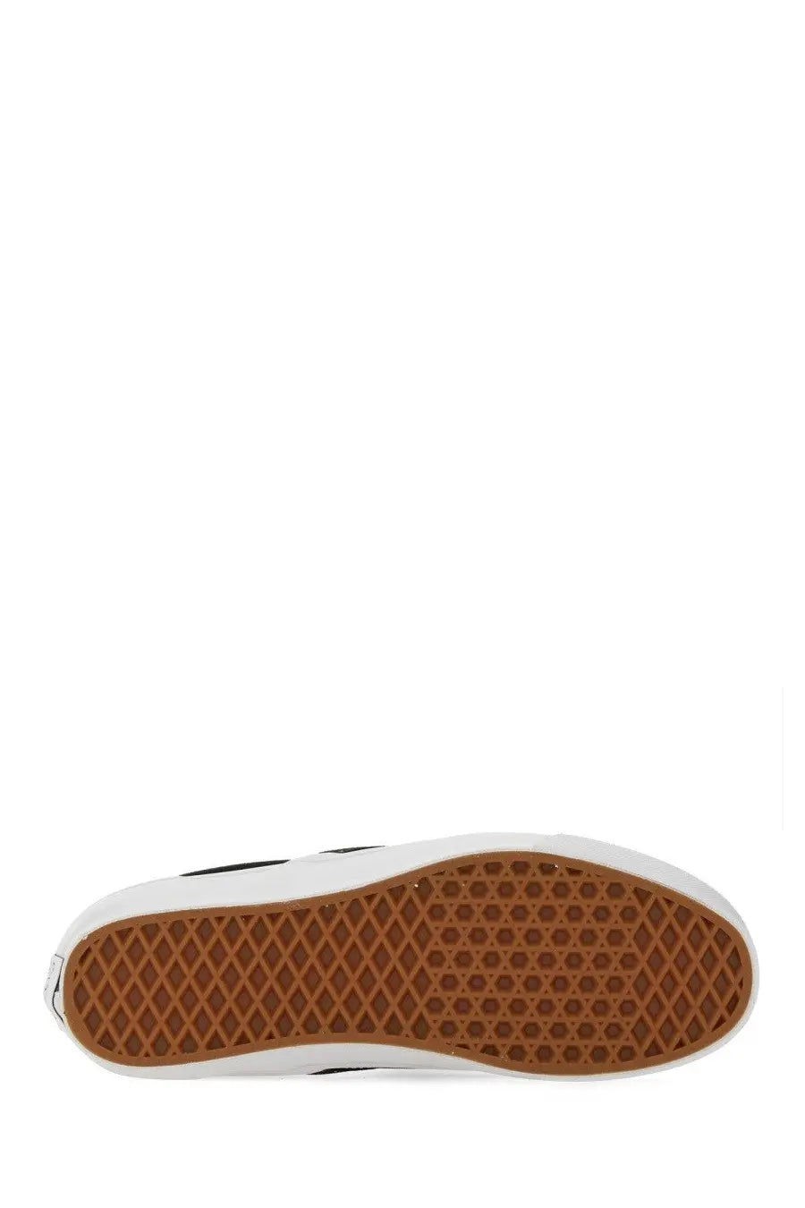 Vans unisex slip on premium sneaker in black and white with brown rubber sole featuring diamond tread pattern