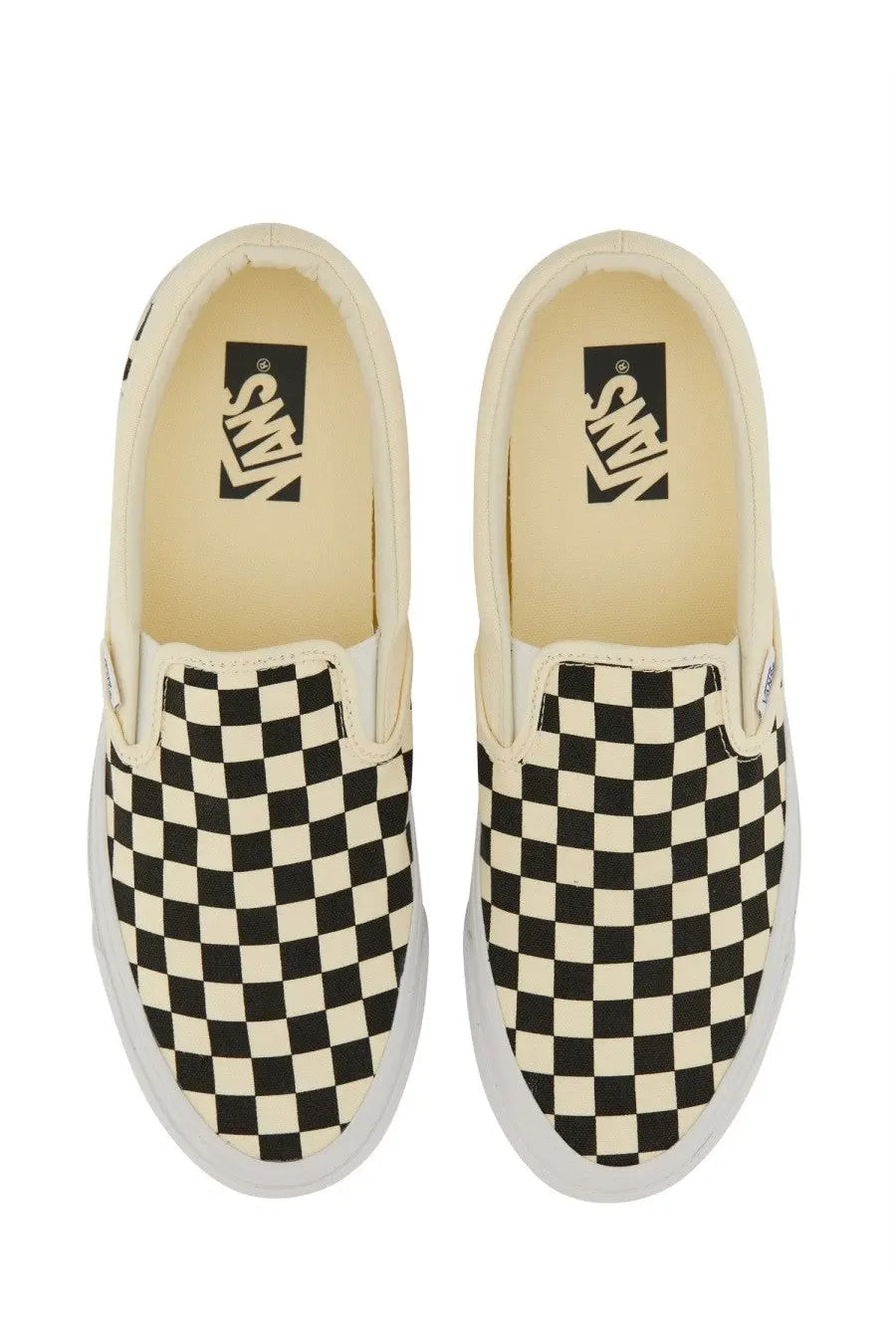 Vans unisex slip on premium white sneakers with black and cream checkerboard pattern slip on design
