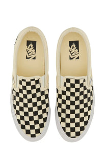 Vans unisex slip on premium white sneakers with black and cream checkerboard pattern slip on design