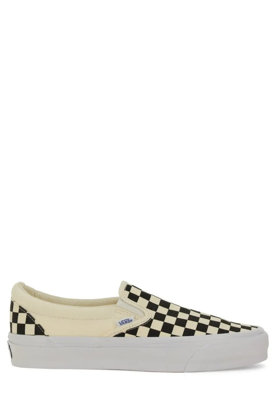 Vans unisex slip on premium white sneaker with black and cream checkerboard canvas and white rubber sole