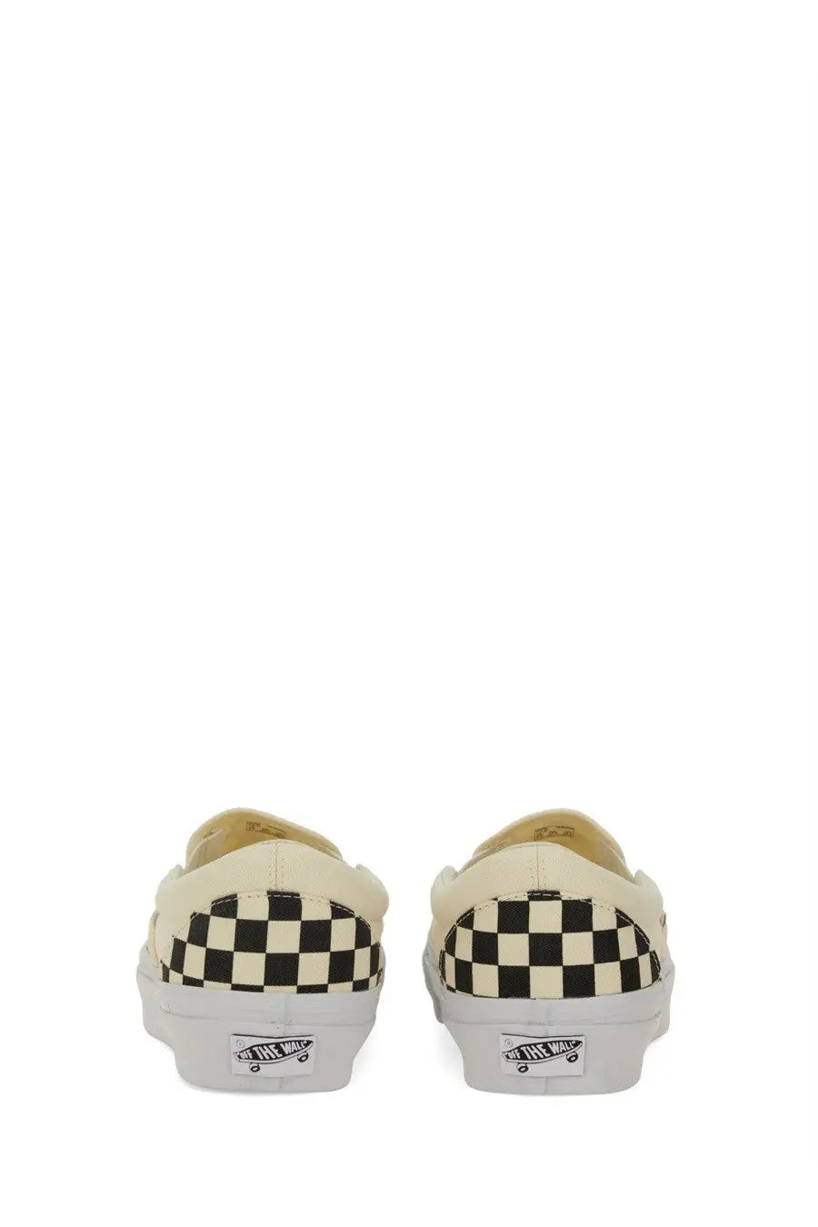 Cream-colored Vans unisex slip-on premium white sneakers with black and white checkerboard pattern on the heel back side