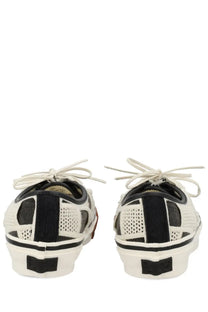 Vans unisex sneaker authentic black with white and black mesh geometric pattern and contrasting rubber soles