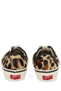 Vans unisex sneaker authentic pattern with leopard print black and tan spots white soles and red heel tabs