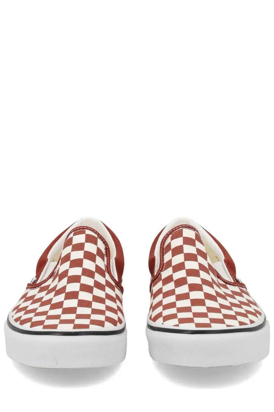 Vans unisex slip on sneaker with red and white checkerboard canvas upper black sole trim and red stitching