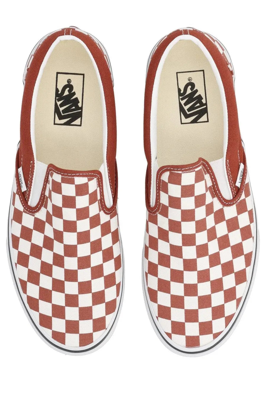 Vans unisex slip on sneaker in red and white checkerboard canvas upper with a slip on design
