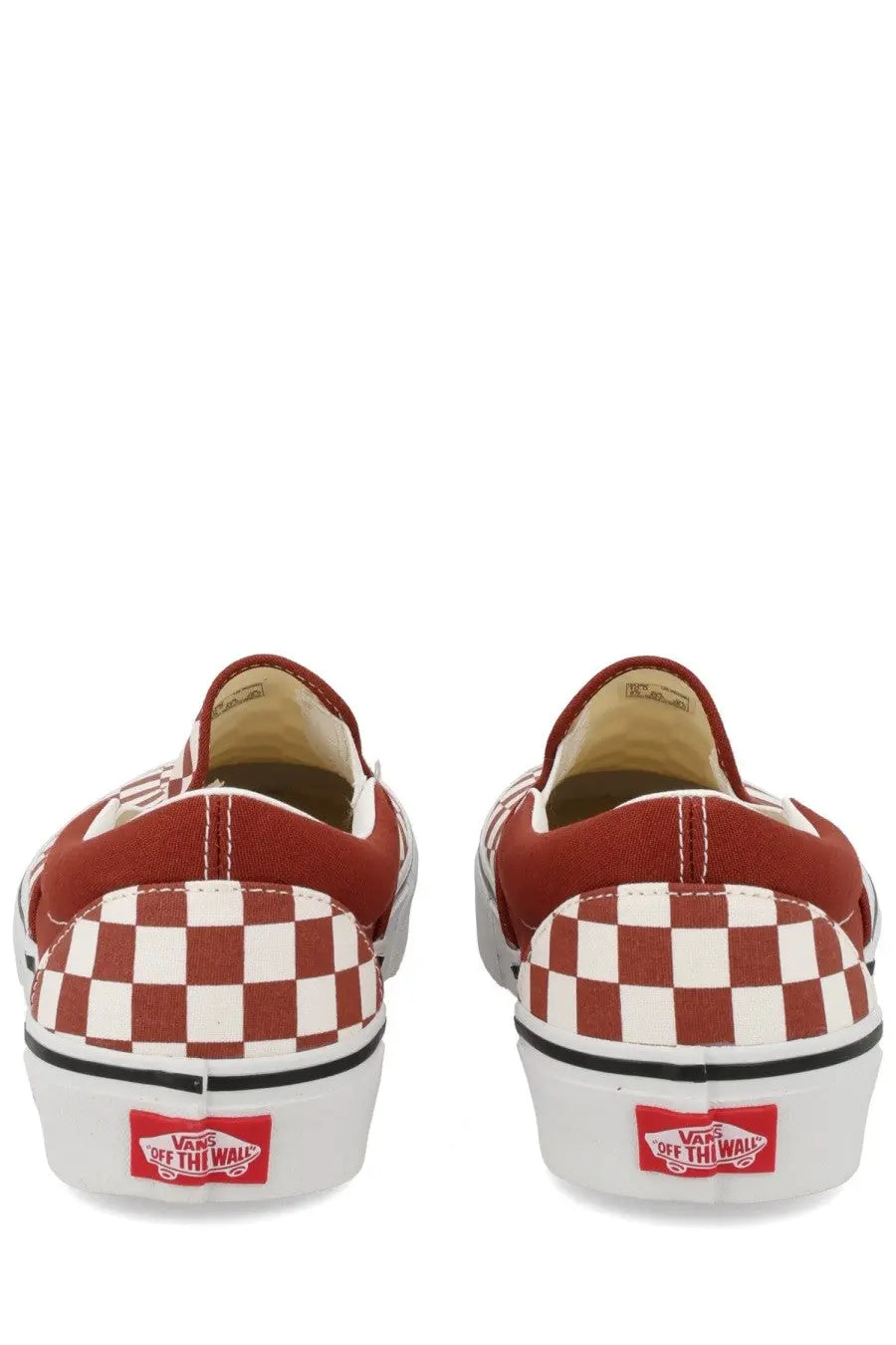 Vans unisex slip-on sneakers featuring red and white checkerboard canvas for casual wear