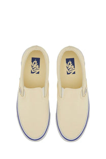 Vans unisex sneaker slip on reissue white cream canvas slip on sneakers with blue rubber sole and classic branding