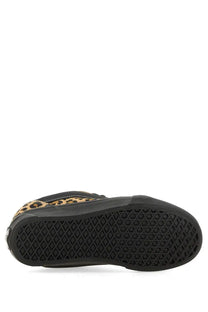 Black and tan leopard-print Vans women’s knu school slip-on sneaker with rubber sole and comfortable fit