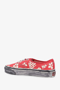 Vans women’s lx authentic canvas sneakers in red with white hibiscus floral pattern and distressed black rubber sole
