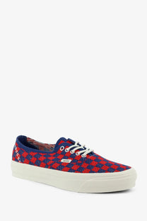 Vans women’s lx authentic fabric sneakers in red and navy blue checkered canvas with white laces and cream sole