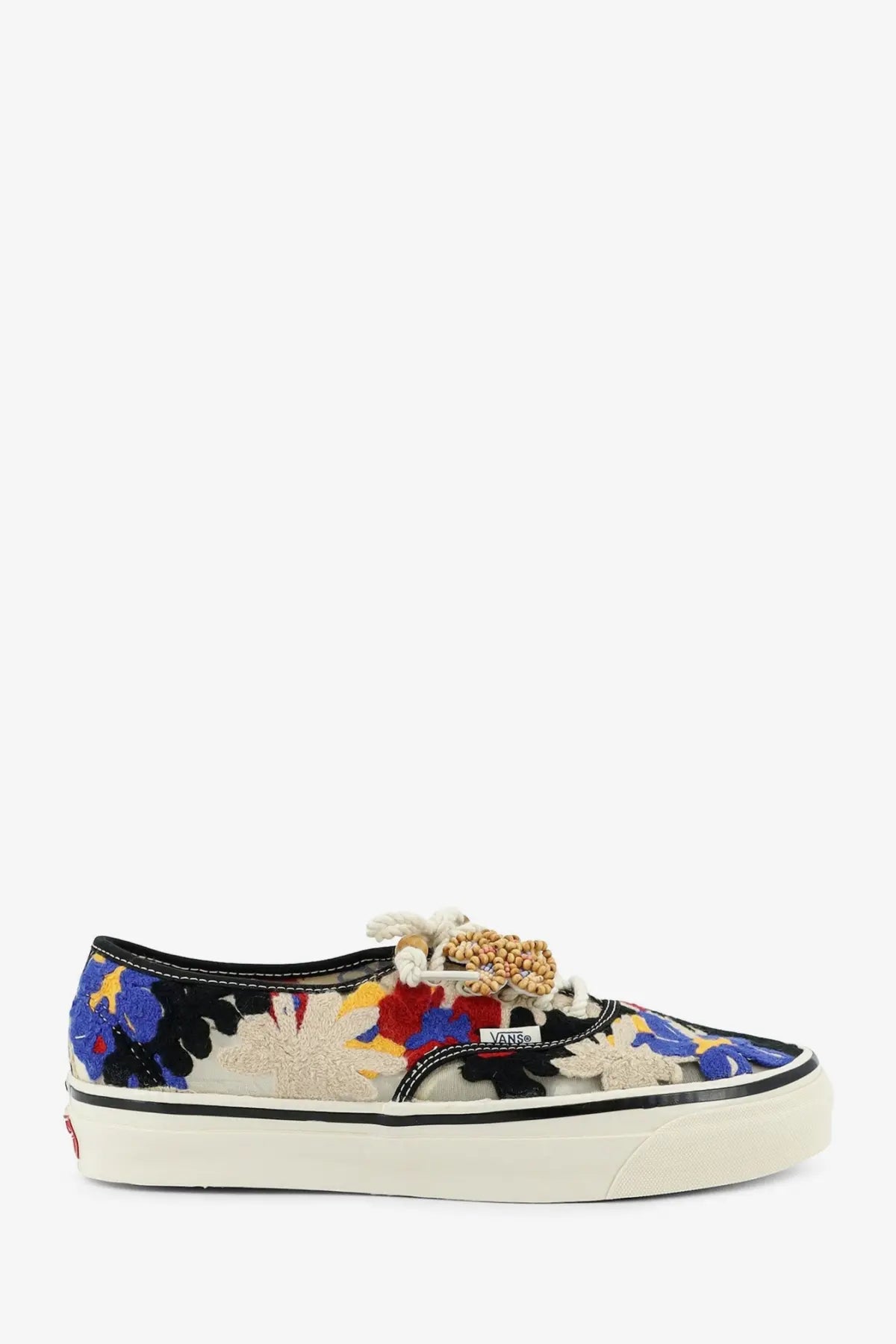 Vans women’s Lx Authentic sneaker with vibrant blue red and yellow floral embroidery on black canvas base