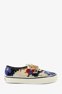 Vans women’s Lx Authentic sneaker with vibrant blue red and yellow floral embroidery on black canvas base