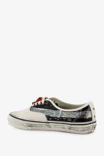 Vans women’s lx authentic suede sneaker in off white with black silver sequined panel and red glitter laces