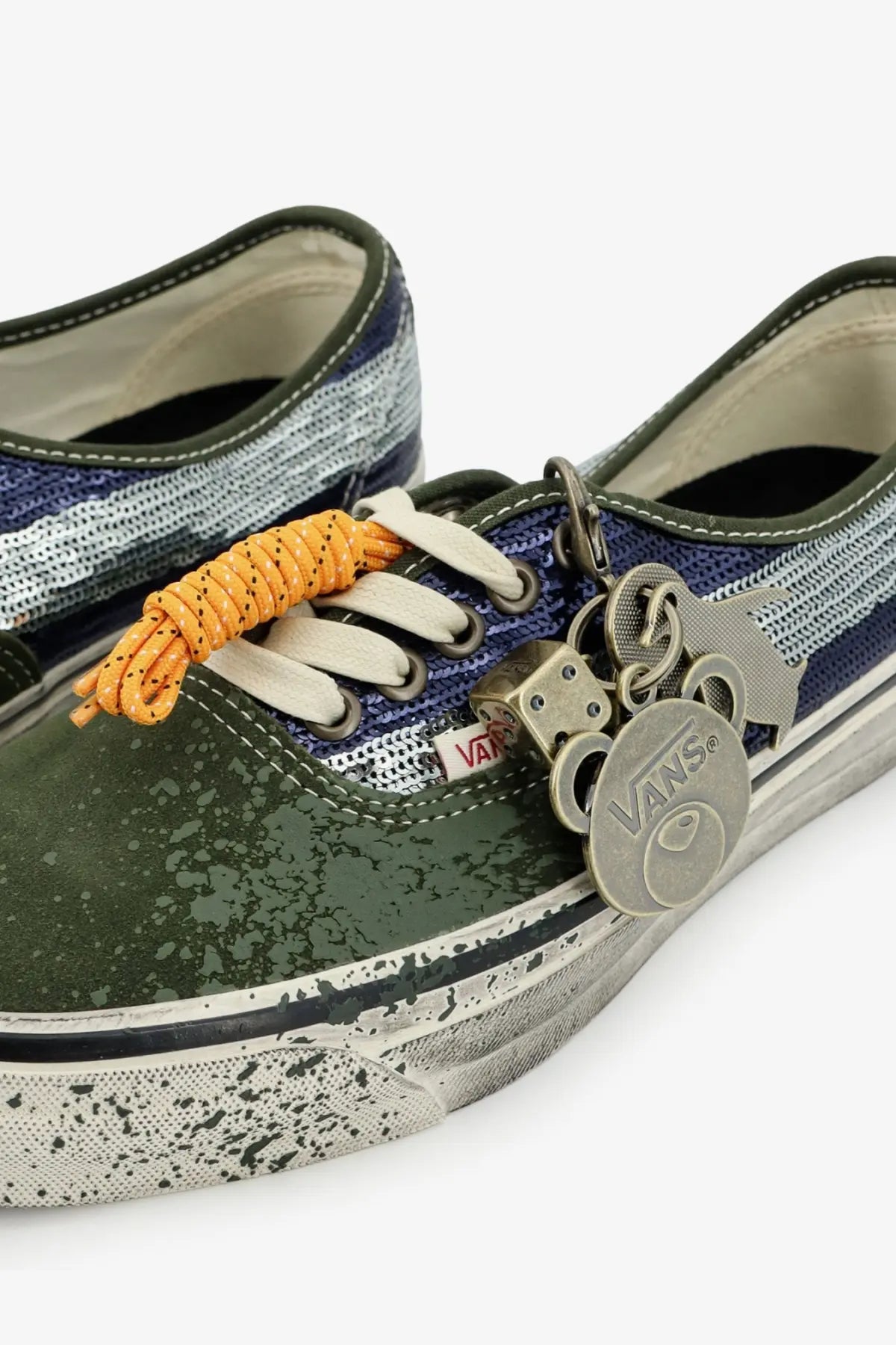 Olive green and navy blue speckled canvas vans women’s lx authentic suede sneakers with white laces and keychain charms