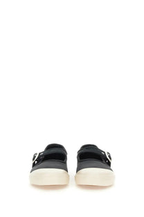 Vans women’s sneaker mary jane low pro black black canvas slip-on with white rubber soles and silver buckle straps