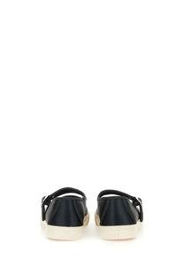 Vans women’s sneaker mary jane low pro black leather with white rubber sole and adjustable strap closure