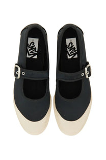 Black vans women’s sneaker mary jane low pro with matte finish cream soles and silver buckle straps