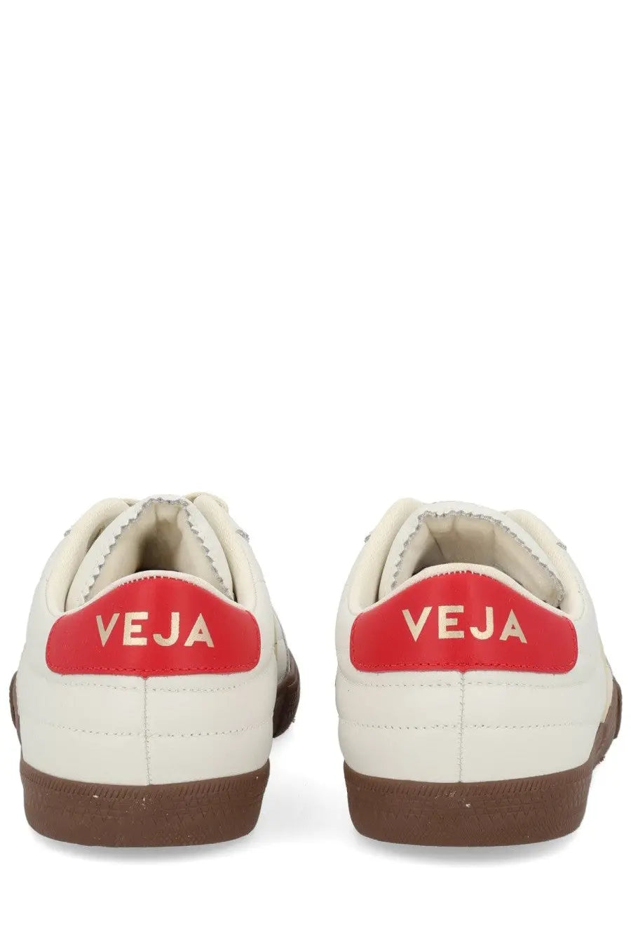 Veja men’s panenka sneaker in cream leather with a bold red heel tab featuring gold logo and brown rubber soles back view