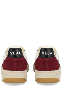 Veja men’s sneaker multicolor cream and burgundy suede with black heel tab featuring Veja logo back view