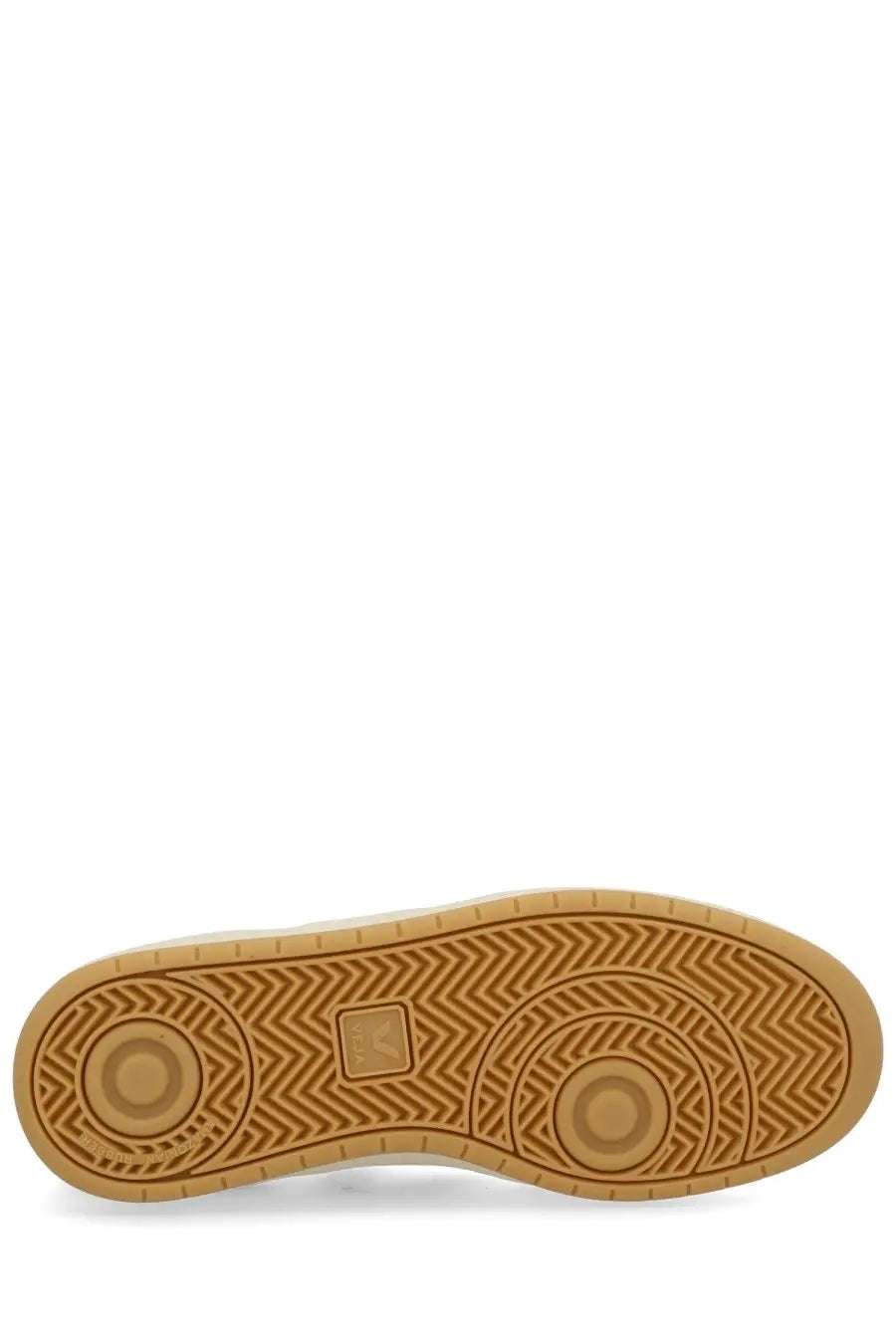 Tan rubber sole with herringbone tread and circular design on veja men’s sneaker multicolor back side