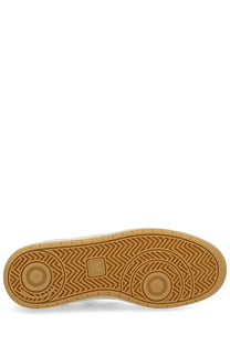 Tan rubber sole with herringbone tread and circular design on veja men’s sneaker multicolor back side