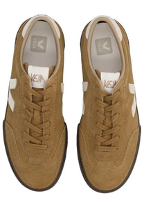 Veja men’s volley sneaker beige in tan suede with white accents and black rubber soles shown from the back side