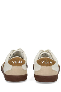 Back view of cream and brown suede veja men’s volley sneaker with veja branding on the heel tab