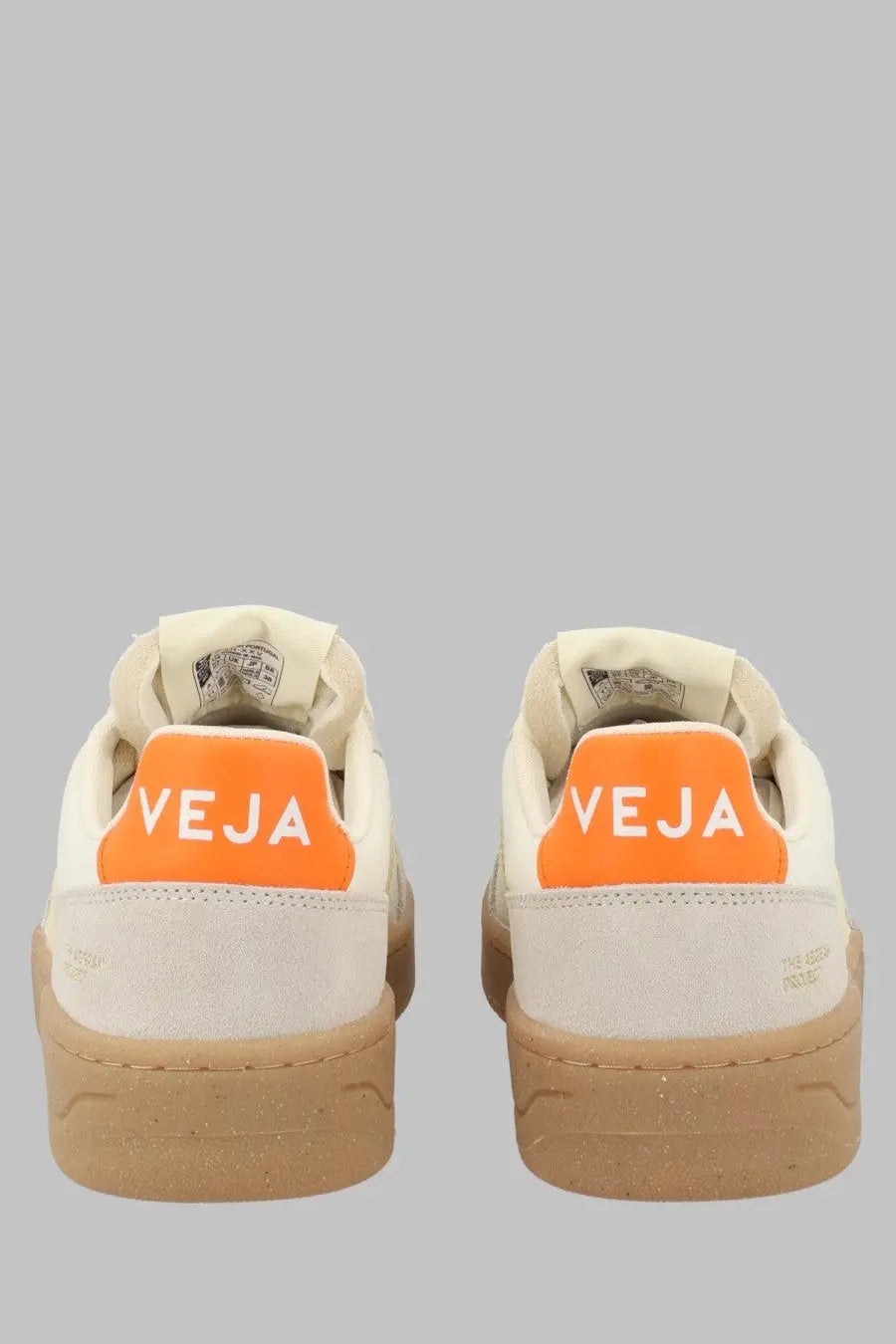Veja unisex sneaker beige cream-colored suede with vibrant orange heel tab featuring veja logo in white on back side