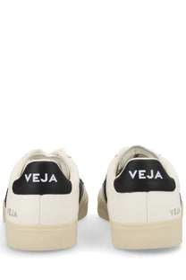 Cream-colored veja unisex sneaker campo white with black leather accents and branding on the heel back side view