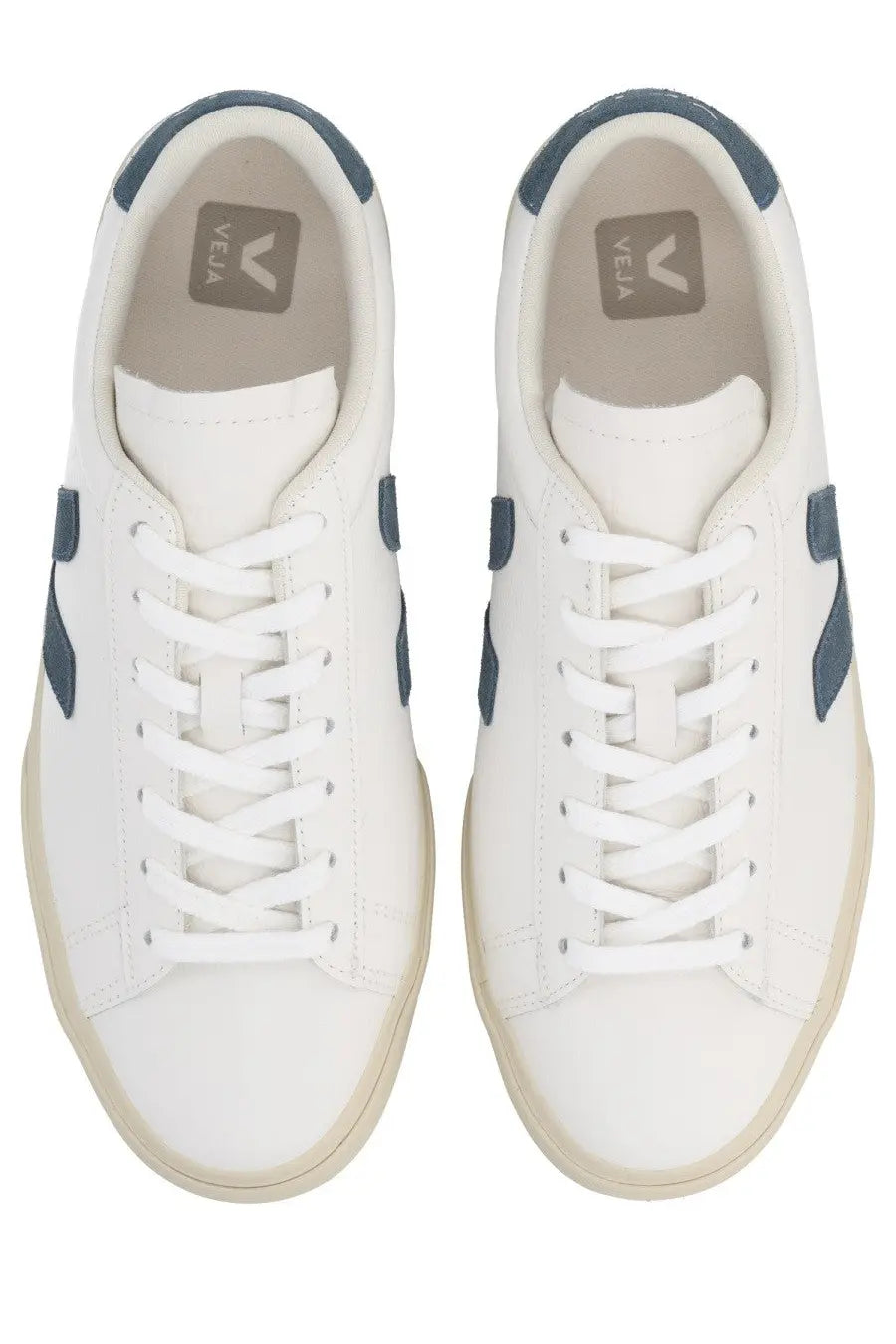 Veja unisex sneaker campo white with white leather, navy blue accents, beige rubber sole, and vela logo on the insole