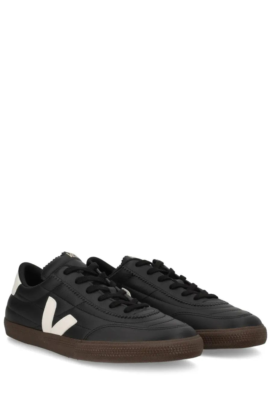 Veja unisex sneaker panenka black leather with white V logo and brown rubber soles visible from the side