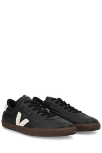 Veja unisex sneaker panenka black leather with white V logo and brown rubber soles visible from the side