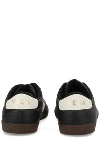 Veja unisex sneaker panenka black with black upper white heel tabs gold lettering and durable rubber sole shown from back