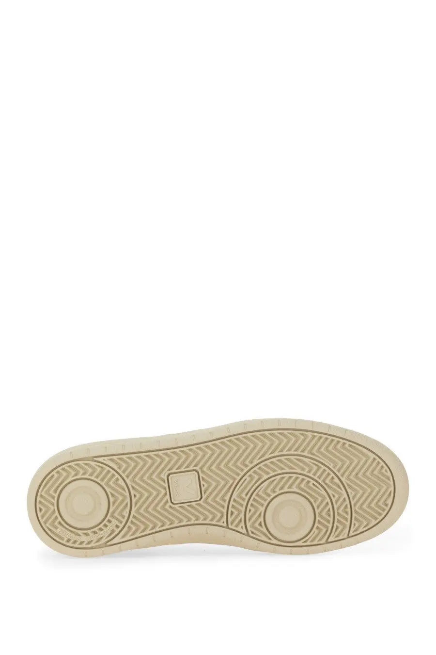 Beige rubber sole with herringbone and circular tread design on veja unisex sneaker white