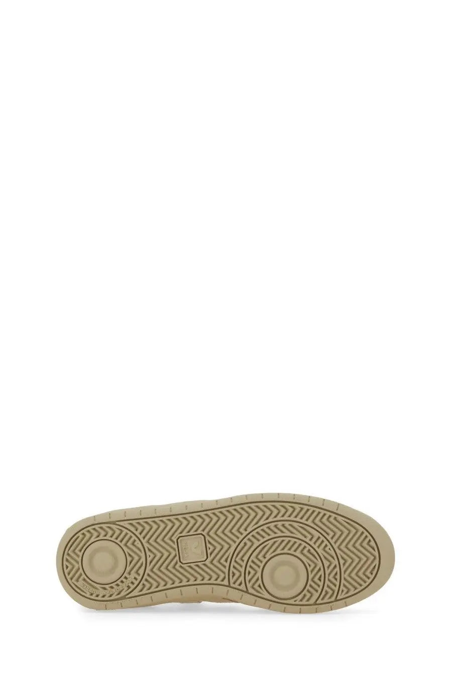 Beige rubber sole with herringbone tread and circular design on veja unisex sneaker white bottom view