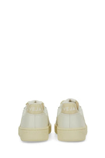 Back side view of veja women’s sneaker beige cream-colored vegan leather minimalist design embossed heel