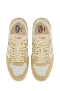 Veja women’s sneaker beige with perforated toe panels and suede upper in beige and white colorway