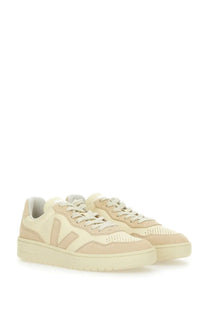 Veja women’s sneaker white in cream-colored suede and leather with minimalist perforated toe box detailing