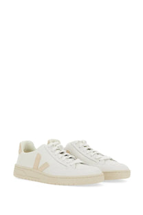 Veja women’s sneaker white featuring white leather with beige accents and a minimalist design with Veja logo on the side