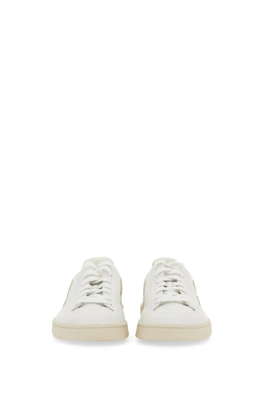 Veja women’s sneaker white with minimalist white leather design and cream-colored soles for casual wear